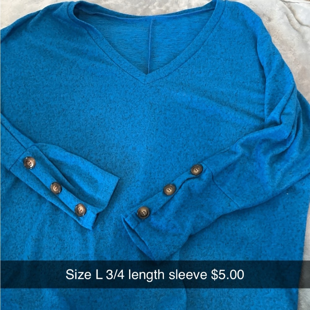 3/4 length sleeve shirt. It is a little oversized
